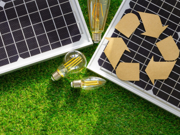 Solar energy panel and light bulb, green energy concept